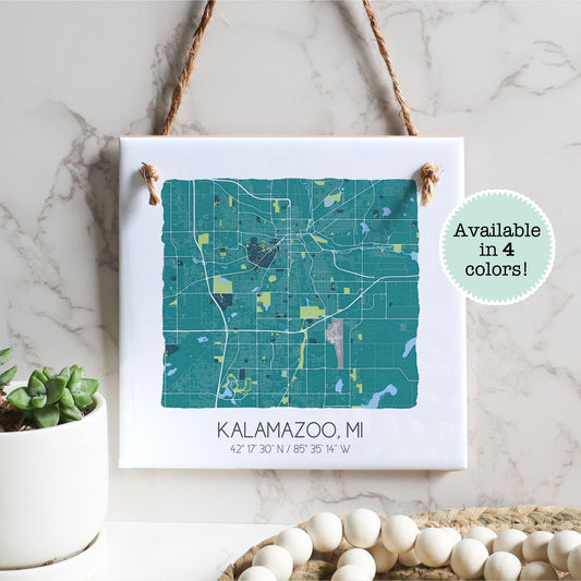 A city map of Kalamazoo Michigan on a square ceramic tile sign hanging on a wall - Sparks House Co