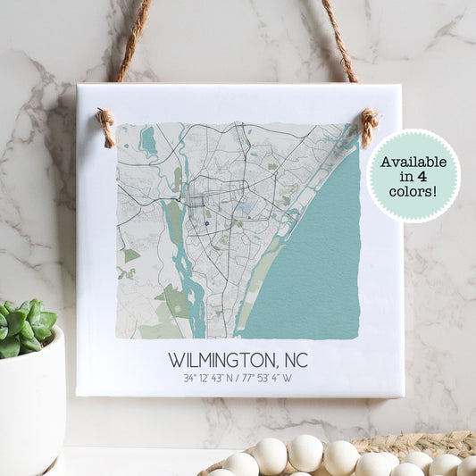 A city map of Wilmington North Carolina on a square ceramic tile sign hanging on a wall - Sparks House Co