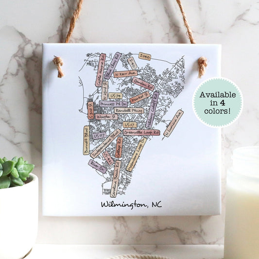 A street map of Wilmington North Carolina on a ceramic square tile sign hanging on a wall - Sparks House Co